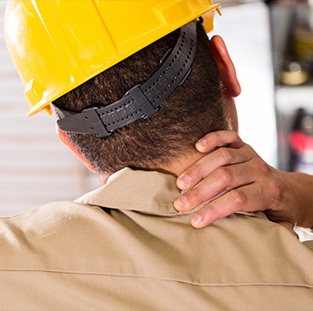 A worker suffering with neck pain