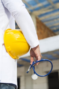 A doctor holding stethoscope in his hand