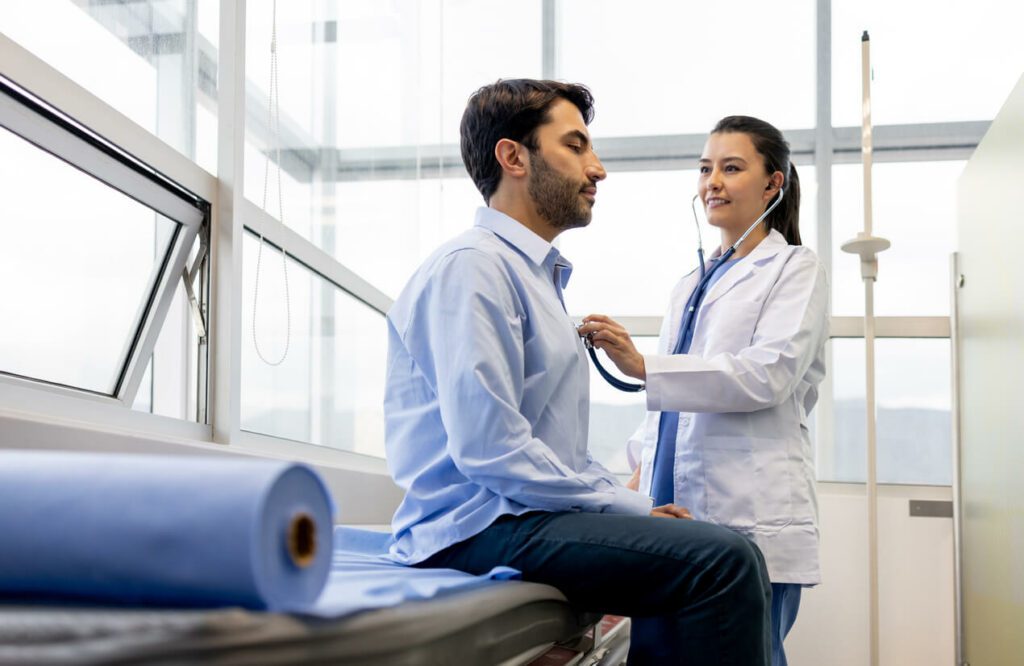 Female doctor examining a patient at her office
